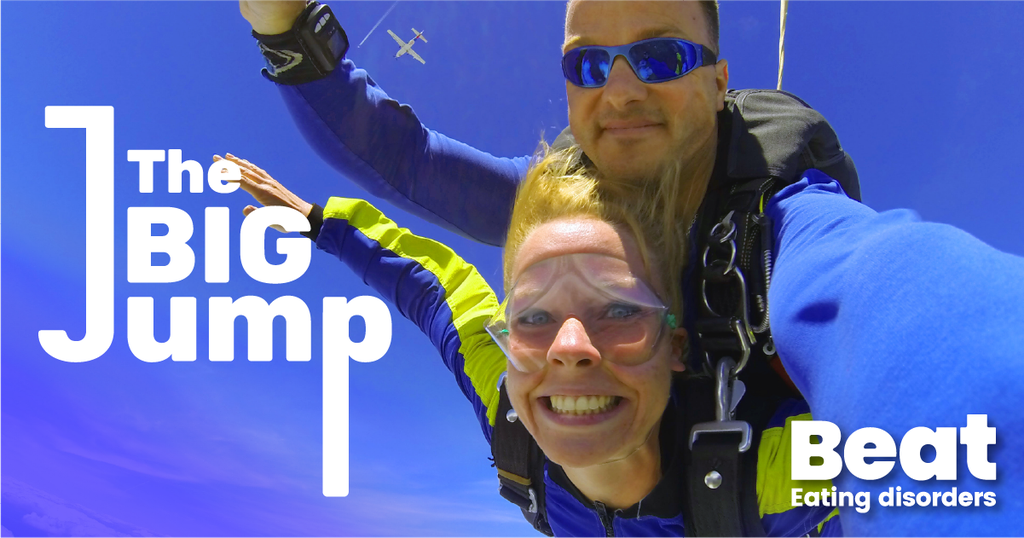 Two people skydiving with the words The Big Jump on the lefthand side